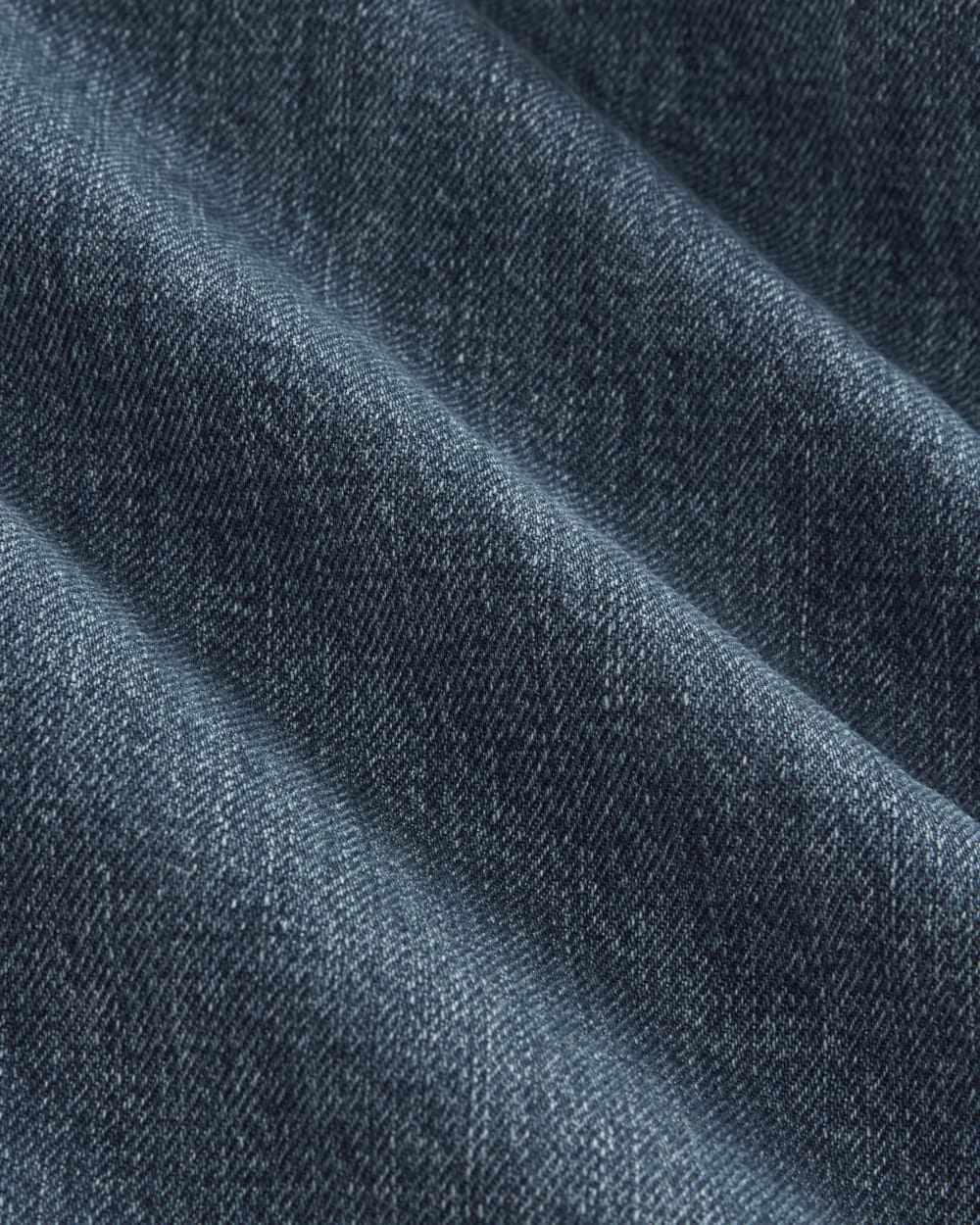 The High Rise Pleated Jean | Mid Indigo